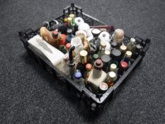 A box containing assorted alcohol miniatures together with a Don Antonio Churchill cigar