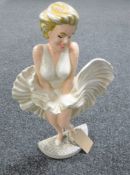 A Marilyn Monroe cast iron door stop