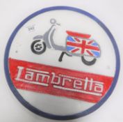 A cast iron circular Lambretta plaque