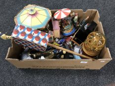 A box of musical carousels, wind up organ grinder,