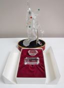 A boxed Swarovski Collector's Society figure - 1999 Masquerade Pierrot, two crystal plaques,