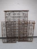Three wrought iron fence panels