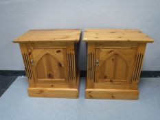 A pair of pine bedside cabinets
