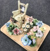 A Capo Di Monte ceramic model : Rocking chair with roses, height 21 cm,