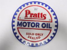 A cast iron Pratts oil plaque