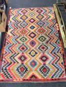 An Afghan wool rug,