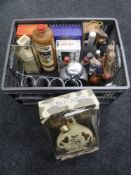 A crate of alcohol gift sets and assorted wines