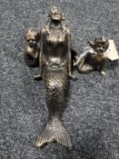 A cast iron mermaid family set (3)