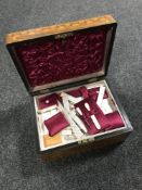 A Victorian inlaid walnut sewing box