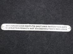 A 3 foot cast iron railway safety plaque