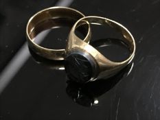 A signet ring and a band ring stamped 375