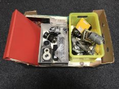 A box of cameras and lenses, camera parts,