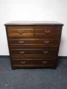 An Edwardian mahogany five drawer chest