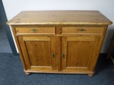 A pine double door sideboard