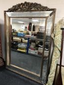 An ornate gilt framed mirror (a/f)