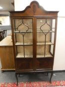 An early 20th century mahogany display cabinet,