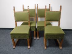 A set of four oak dining chairs