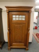 An early 20th century oak side cabinet,