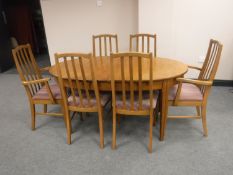 A late 20th century dining table and six chairs