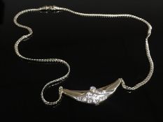 An 18ct gold diamond necklace, approximately 1.2 ct. 17.