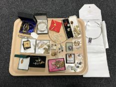 A collection of costume jewellery including brooches, bangles, 9ct gold crucifix pendant etc.