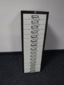 A fifteen drawer metal index chest