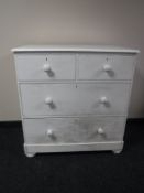 A painted pine four drawer chest