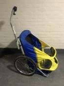 A Trail-a-tot bike trailer
