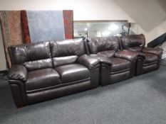 A three piece brown leather lounge suite