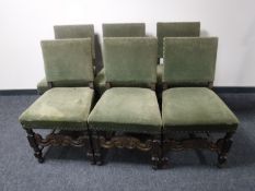 Six oak dining chairs upholstered in green dralon