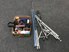 A box of assorted cameras and accessories with projector screen and camera flash stand