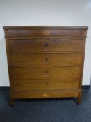 A late 19th century mahogany and oak five drawer chest