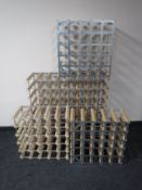 Four wooden and metal wine racks