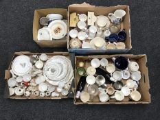 Four boxes of commemorative and crested china