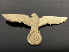 A German badge with swastika emblem