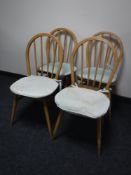 A set of four Ercol dining chairs CONDITION REPORT: In good condition.