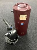 A cased Baker of London microscope with lighting unit