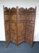A carved hardwood Eastern room divider