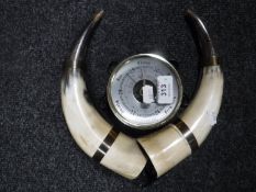 A cow horn barometer