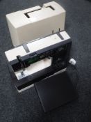 A Husqvarna Optima 190 Selectronic sewing machine in case with computer control and pedal