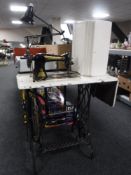 A mid 20th century Singer treadle sewing machine