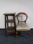A Victorian mahogany balloon back chair and a Victorian tiled topped three tier plant stand