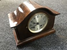 A 20th century mahogany mantel clock with pendulum