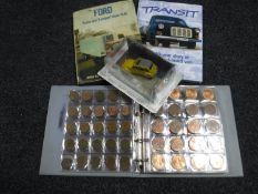 A coin album containing pre-decimal British coins,