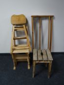 A pine plate rack, a pine library chair,