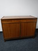 A mid 20th century teak audio cabinet