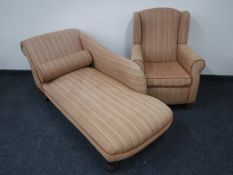 A contemporary chaise longue and matching armchair upholstered in a striped fabric