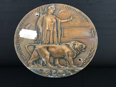 A WWI bronze death plaque,