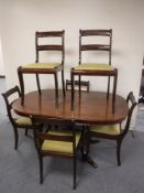 A mahogany pedestal table and six chairs