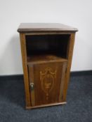A Victorian inlaid mahogany pot cupboard